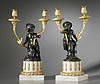A very fine pair of Louis XVI gilt and patinated bronze and white marble figural candelabra attributed to Louis-Félix de Larue after a design by the celebrated sculptor Clodion